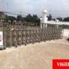 Cổng xếp tự động V06HR inox cao cấp tích hợp hàng rào chắn an ninh